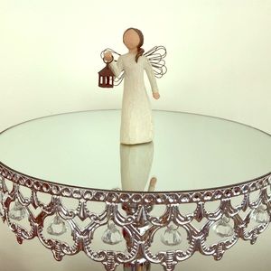 Willow Tree - Angel of Hope. Girl holding lantern.